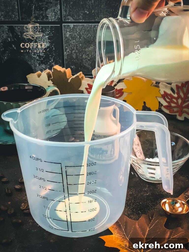 3-Ingredient Maple Whipped Cream Recipe 4 Pour the cream into a tall measuring cup.