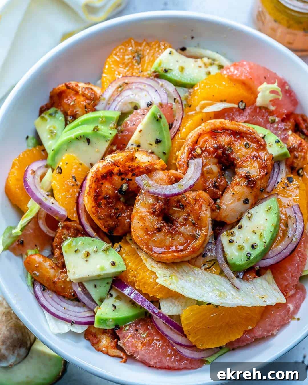 shrimp salad in a white bowl.
