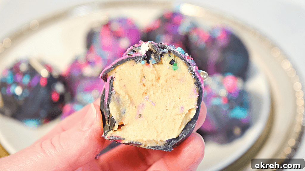 A moon rock cookie dough bite cut in half to show the inside