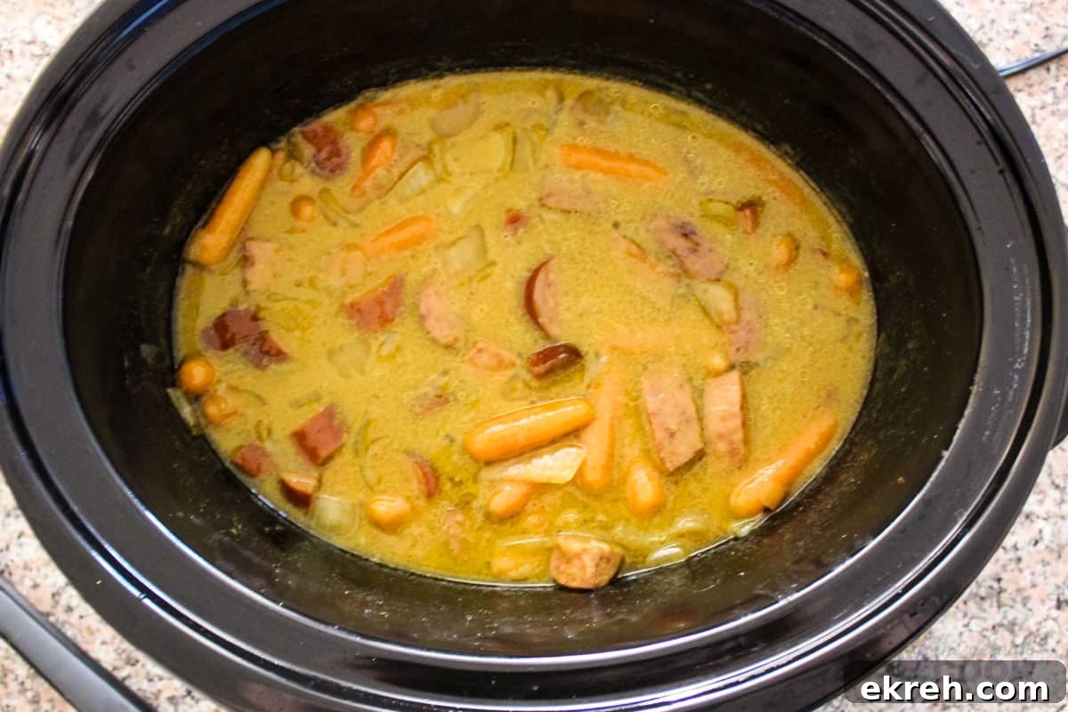 Slow cooker curried sausages after cooking for 6 hours on low.