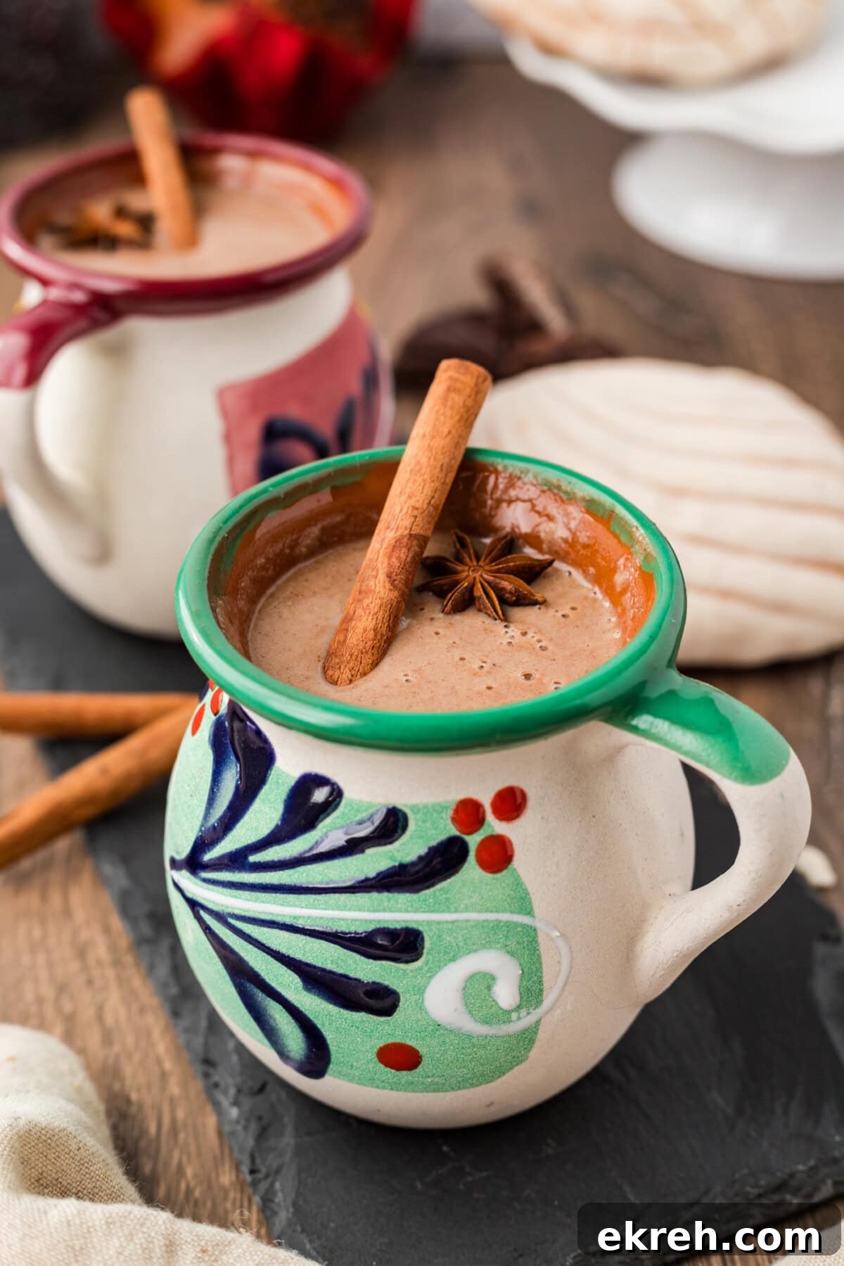 Champurrado Recipe: Authentic Mexican Hot Chocolate 5 Side photo of a green mug filled with Champurrado