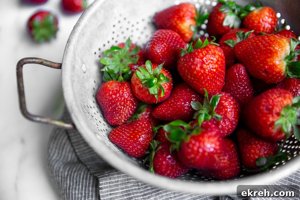 Washed strawberries in colander