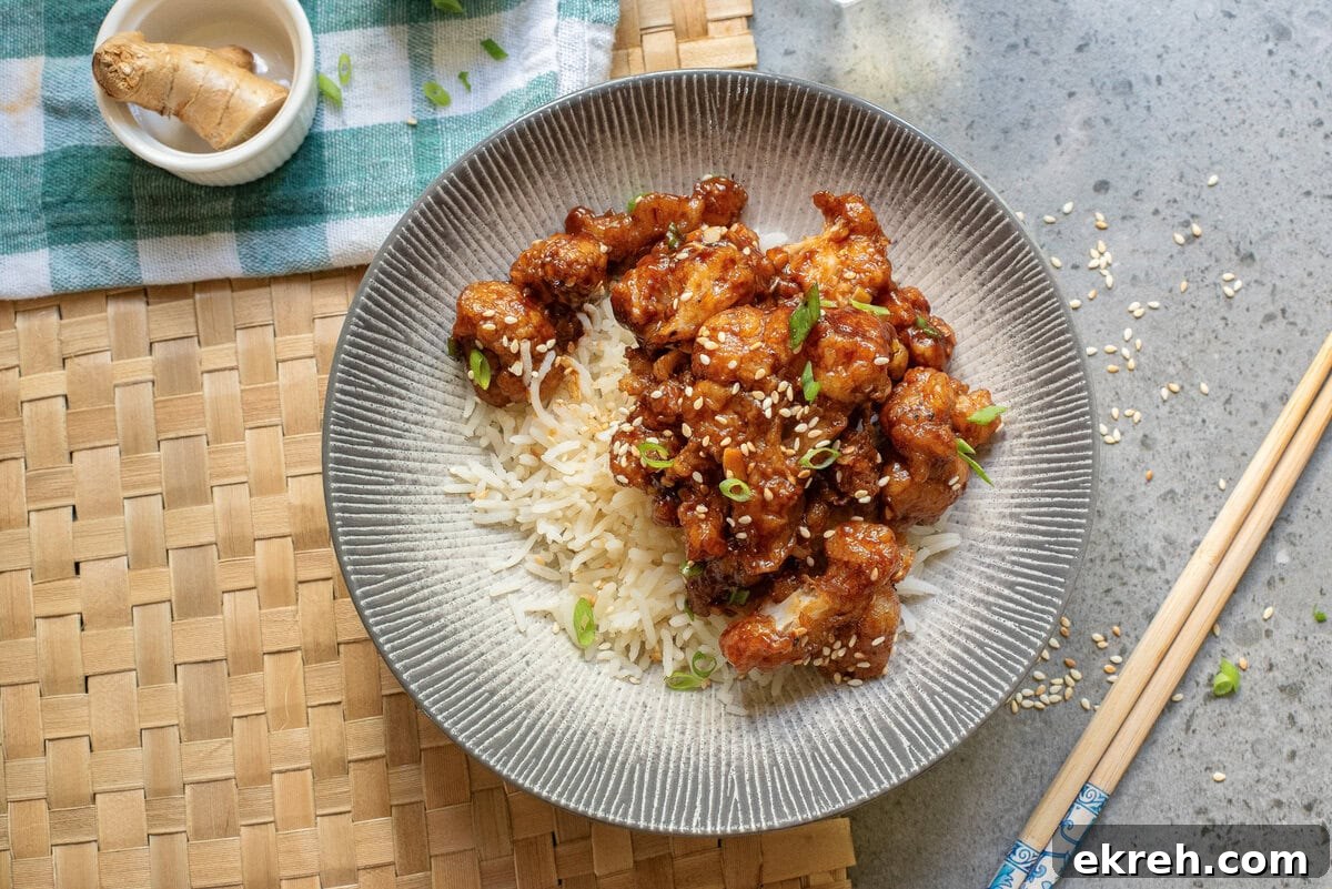 An overhead image of gobi manchurian over rice.