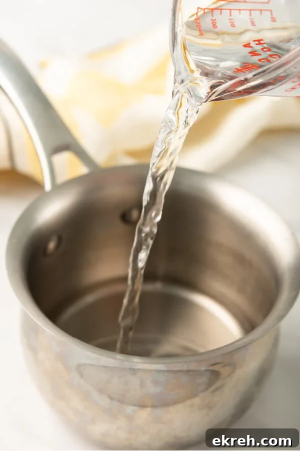 adding water to pan