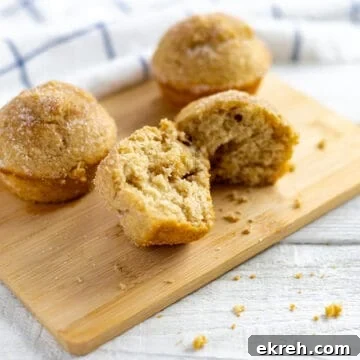 baked muffins on wooden cutting board