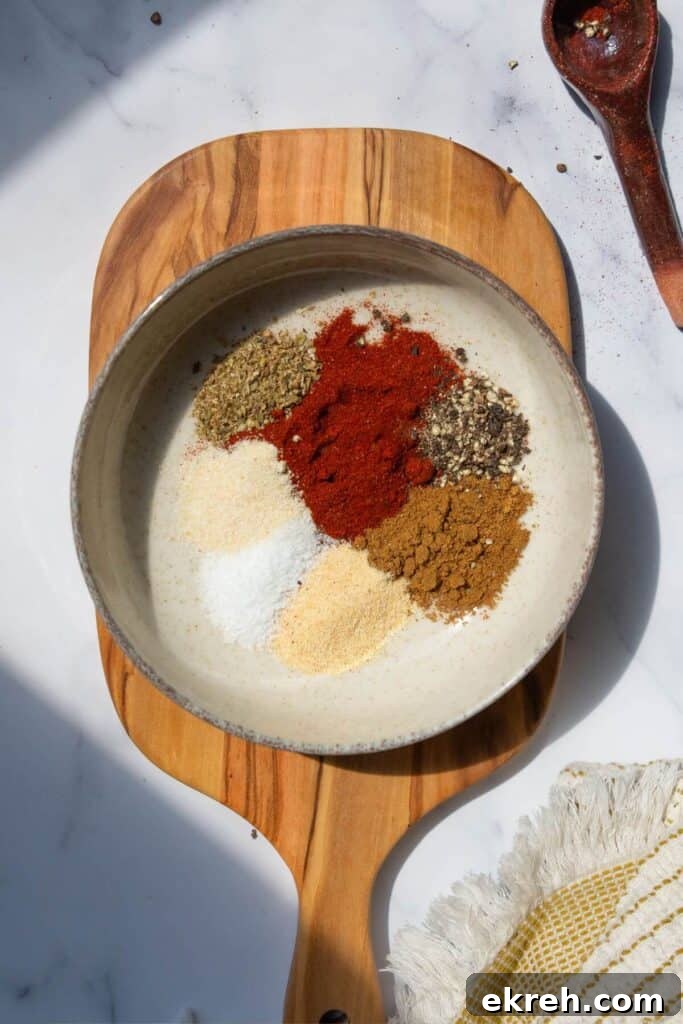 All spices in ground turkey seasoning sectioned in a bowl before mixing.