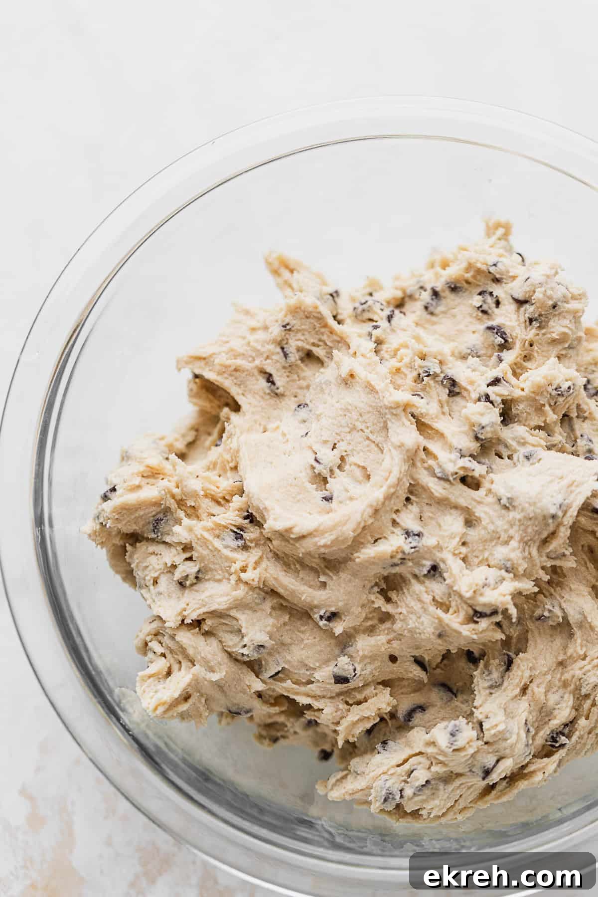 Cookie dough in glass bowl.