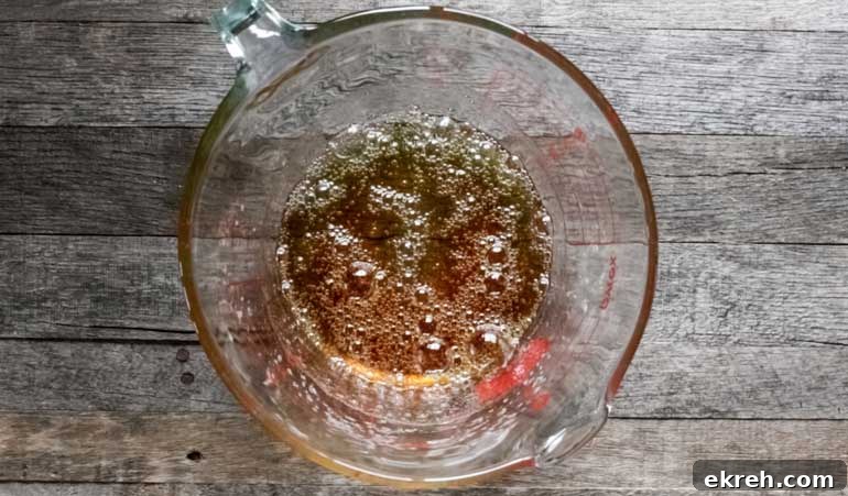 Cooked sugar syrup for peanut brittle