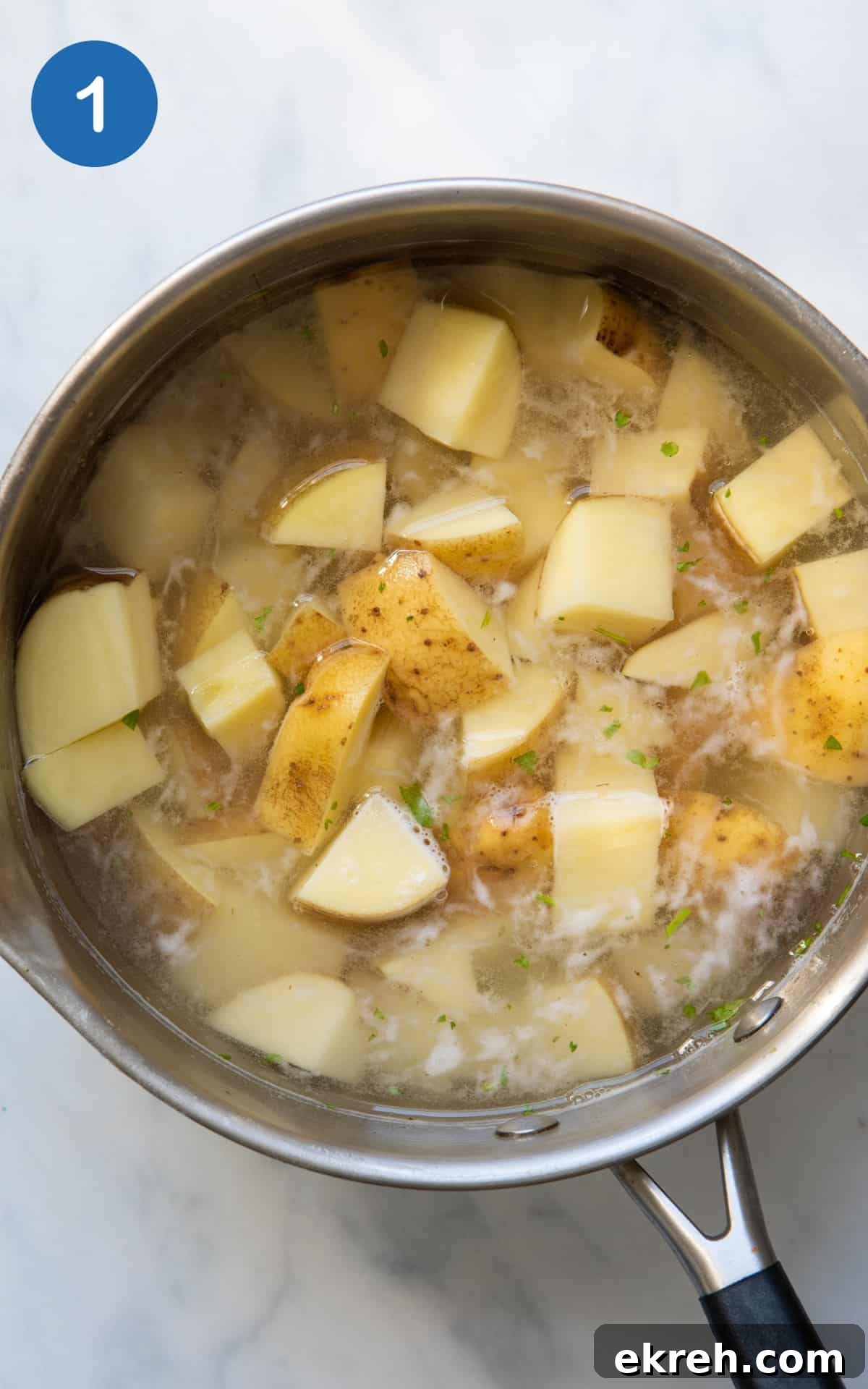 Potatoes in a cooking pot.
