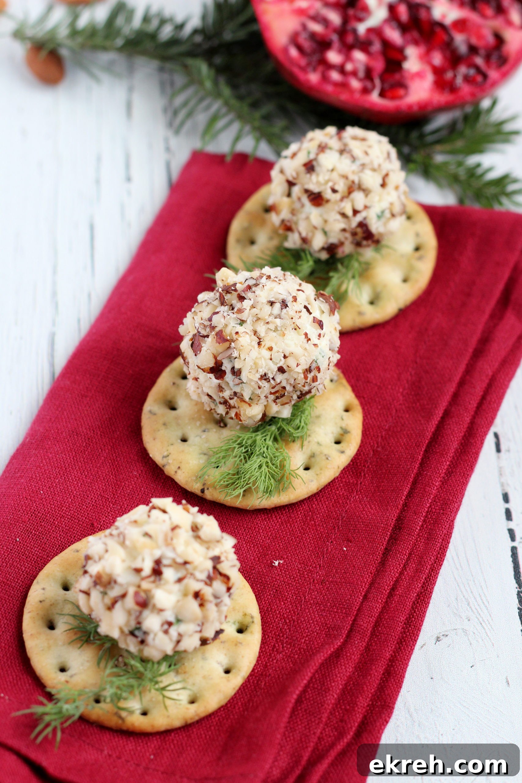 Creamy Cheese Ball Bites Recipe 3 cheese balls covered in chopped almonds