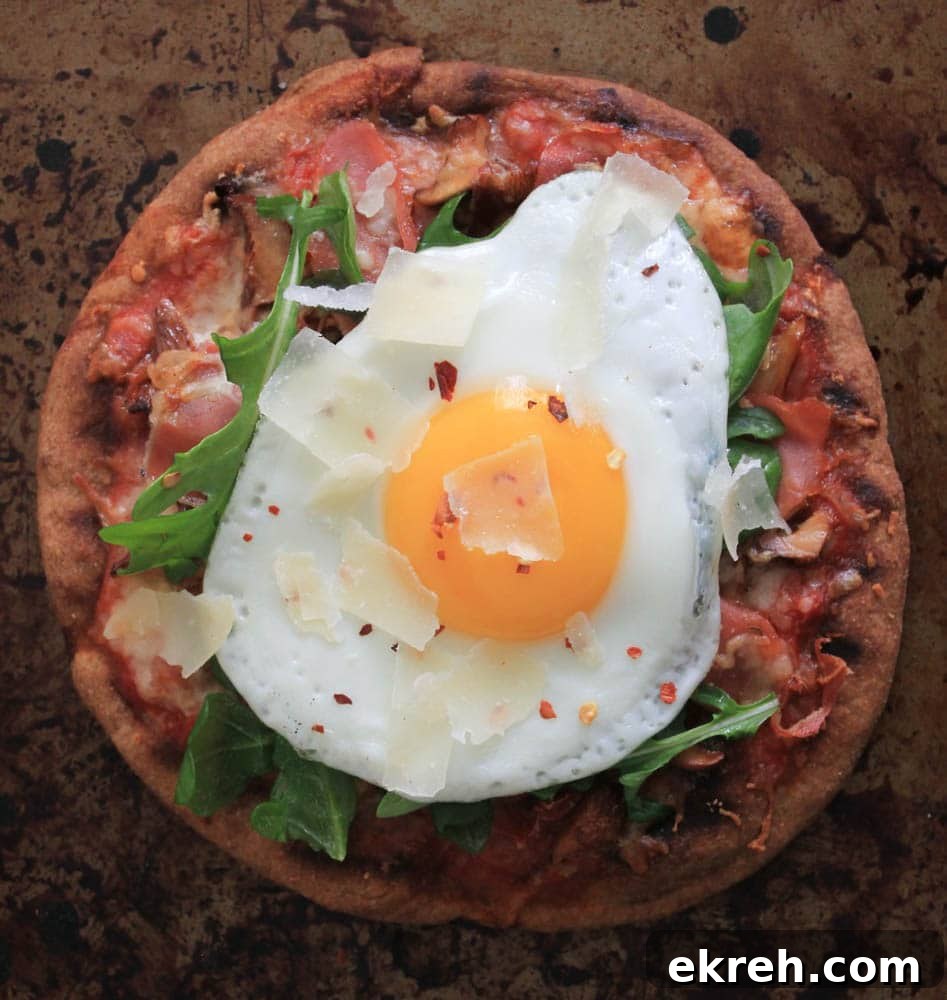 Grilled Pita Pizza with Prosciutto, Chanterelles, Arugula and Fried Egg 6 grilled-pita-pizzas-with-prosciutto-chanterelles-arugula-and-a-fried-egg-5
