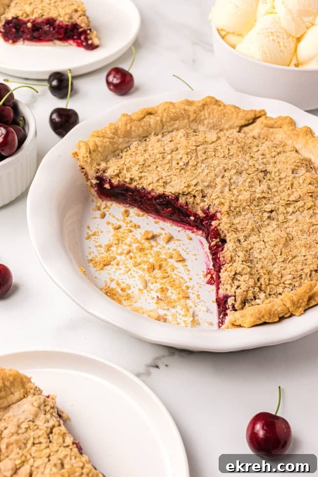 Cherry Crumb Pie with Frozen Tart Cherries 5 cut Cherry Crumb Pie in a white pie dish