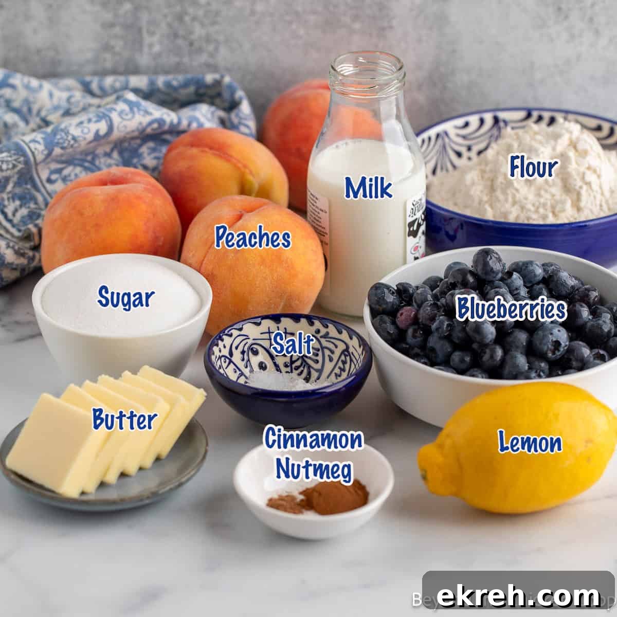 Ingredients needed for making a peach and blueberry cobbler. 