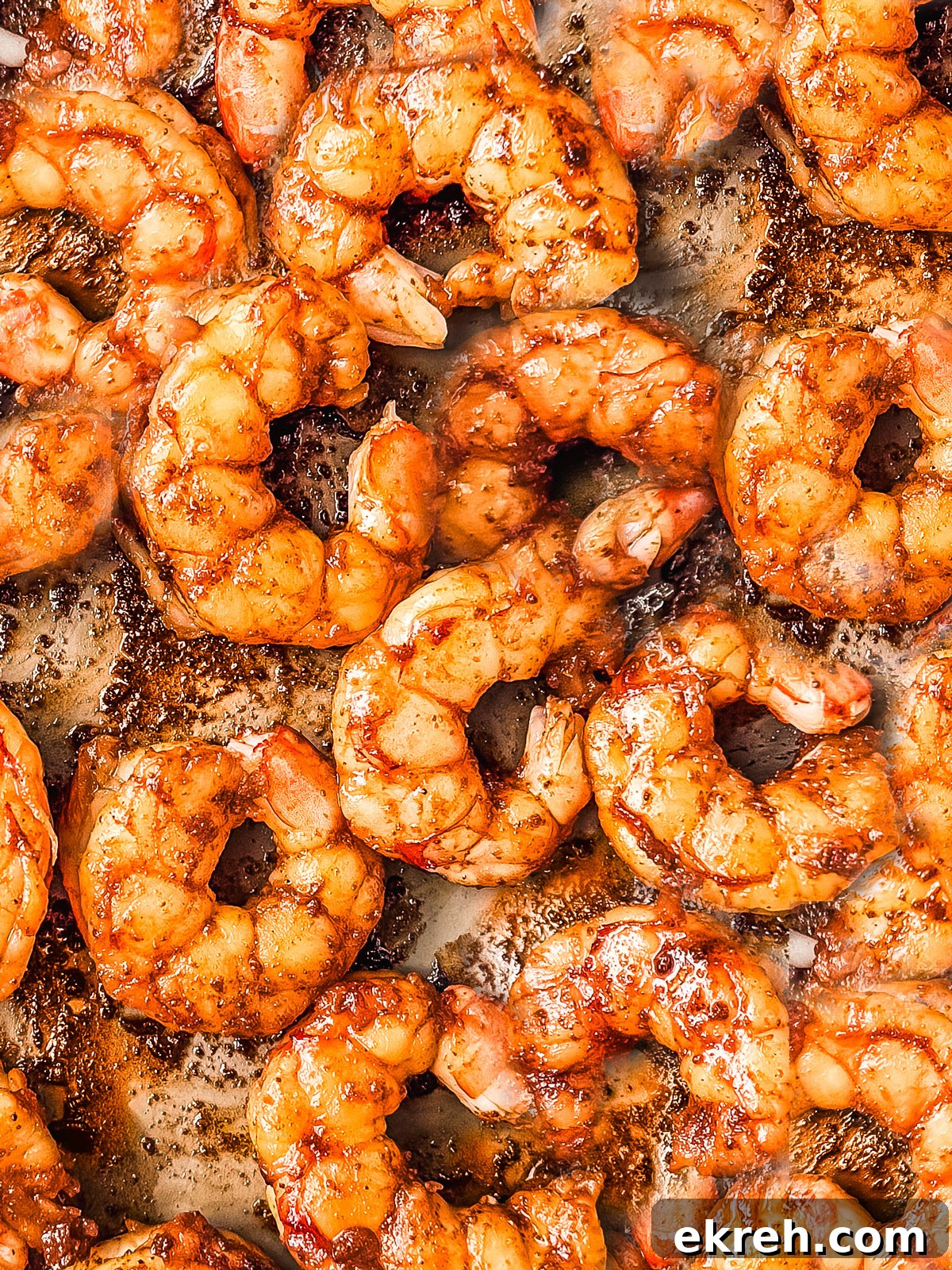 Close up of juicy pan-fried shrimp.