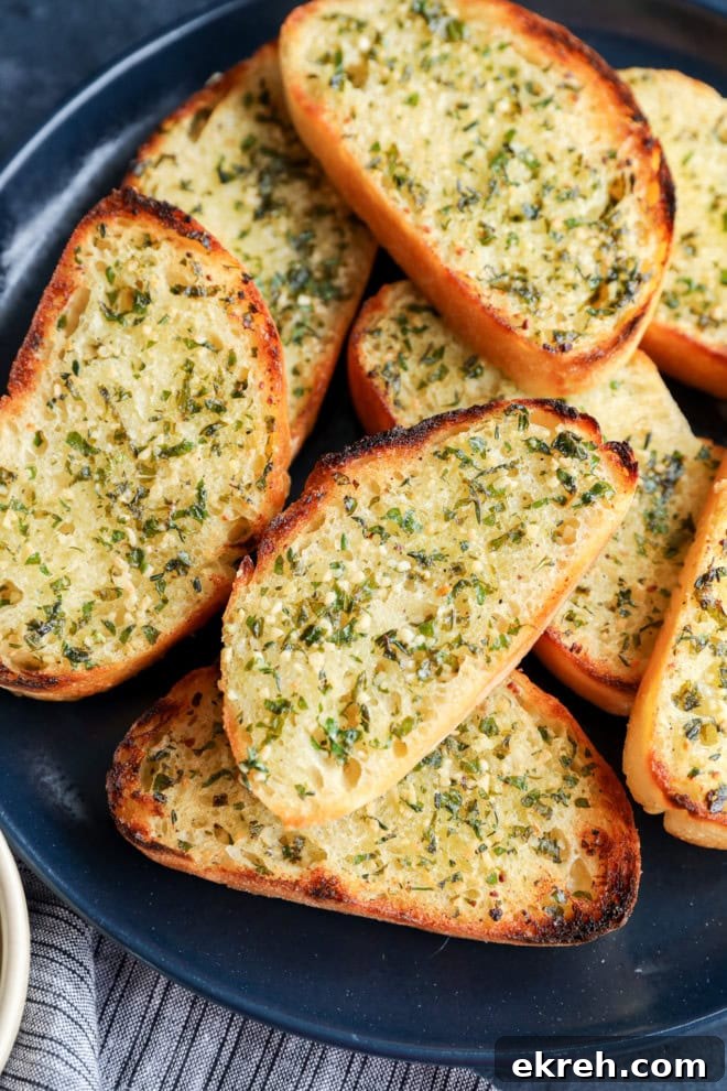 Crispy Sourdough Garlic Toast with Herb Butter 5 plate of slices of bread