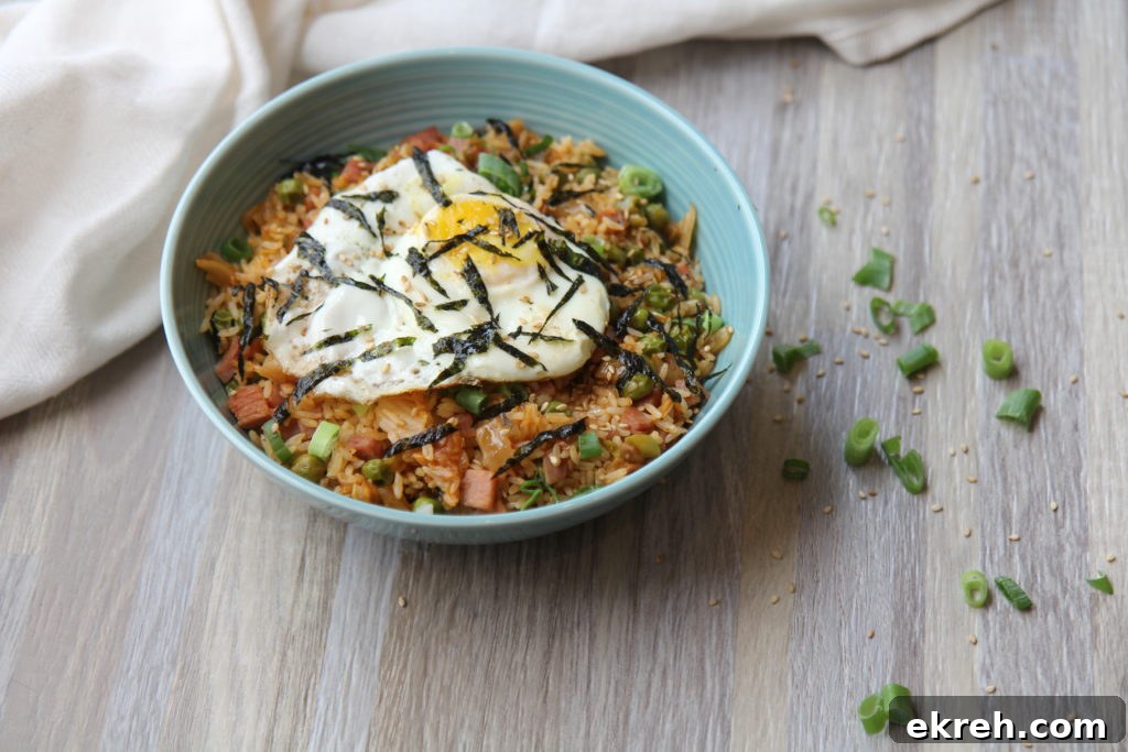 Gluten-Free Kimchi Fried Rice Topped with a Fried Egg 2 Kimchi fried rice with egg and ham - gluten-free