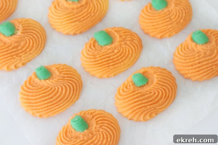 Piped pumpkin cookies.