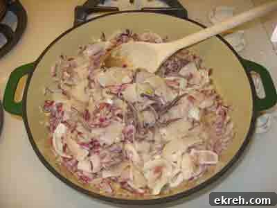 Beginning to saute the squid, onions and garlic.