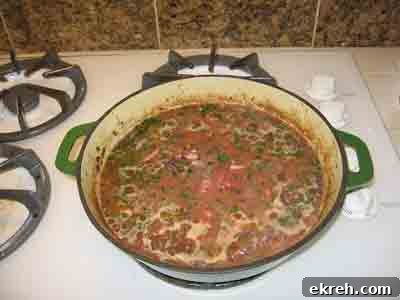 Squid simmering with tomatoes.