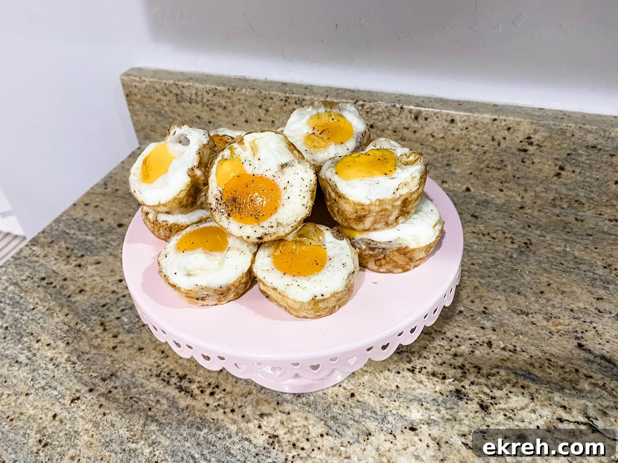 baked hashbrown egg bites stacked on plate