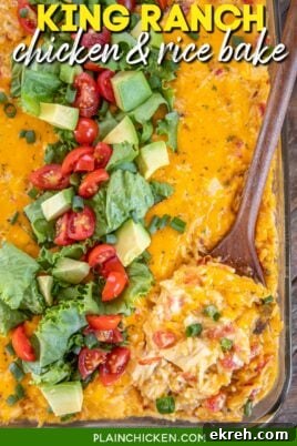 cheesy chicken and rice casserole topped with lettuce and tomatoes with text overlay