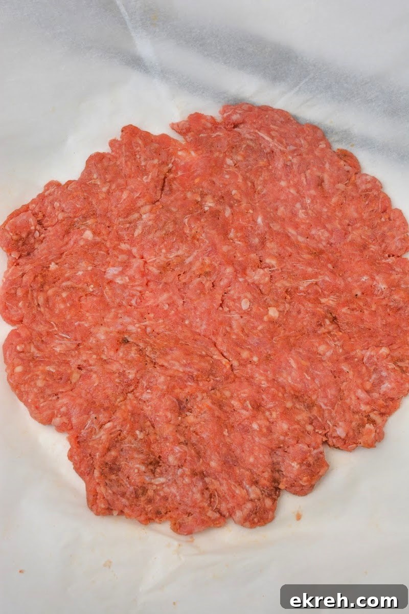 Keto Cheeseburger Dogs Recipe: Low-Carb Stuffed Hot Dogs 9 Spreading out ground beef into a thin layer