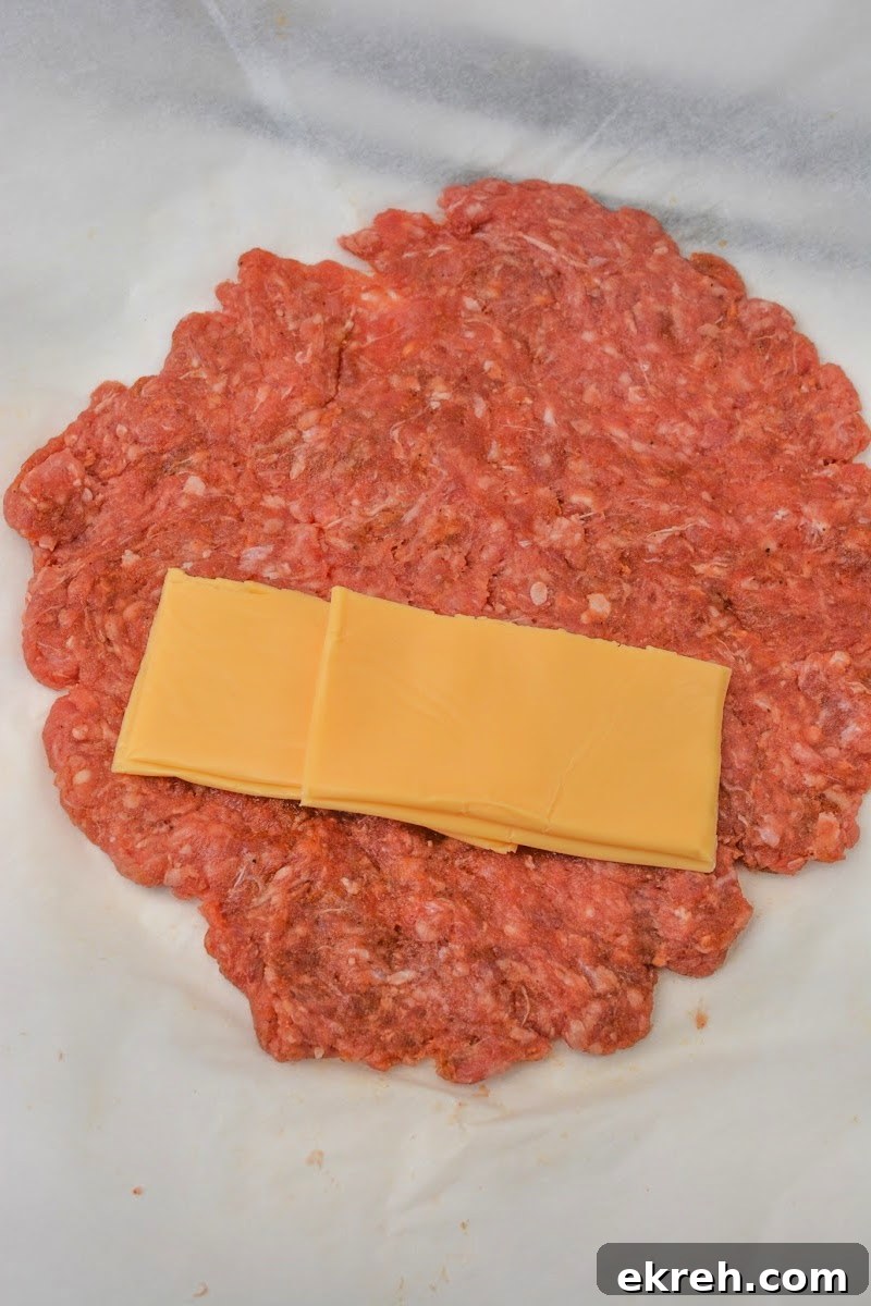 Keto Cheeseburger Dogs Recipe: Low-Carb Stuffed Hot Dogs 10 Adding cheese to the ground beef