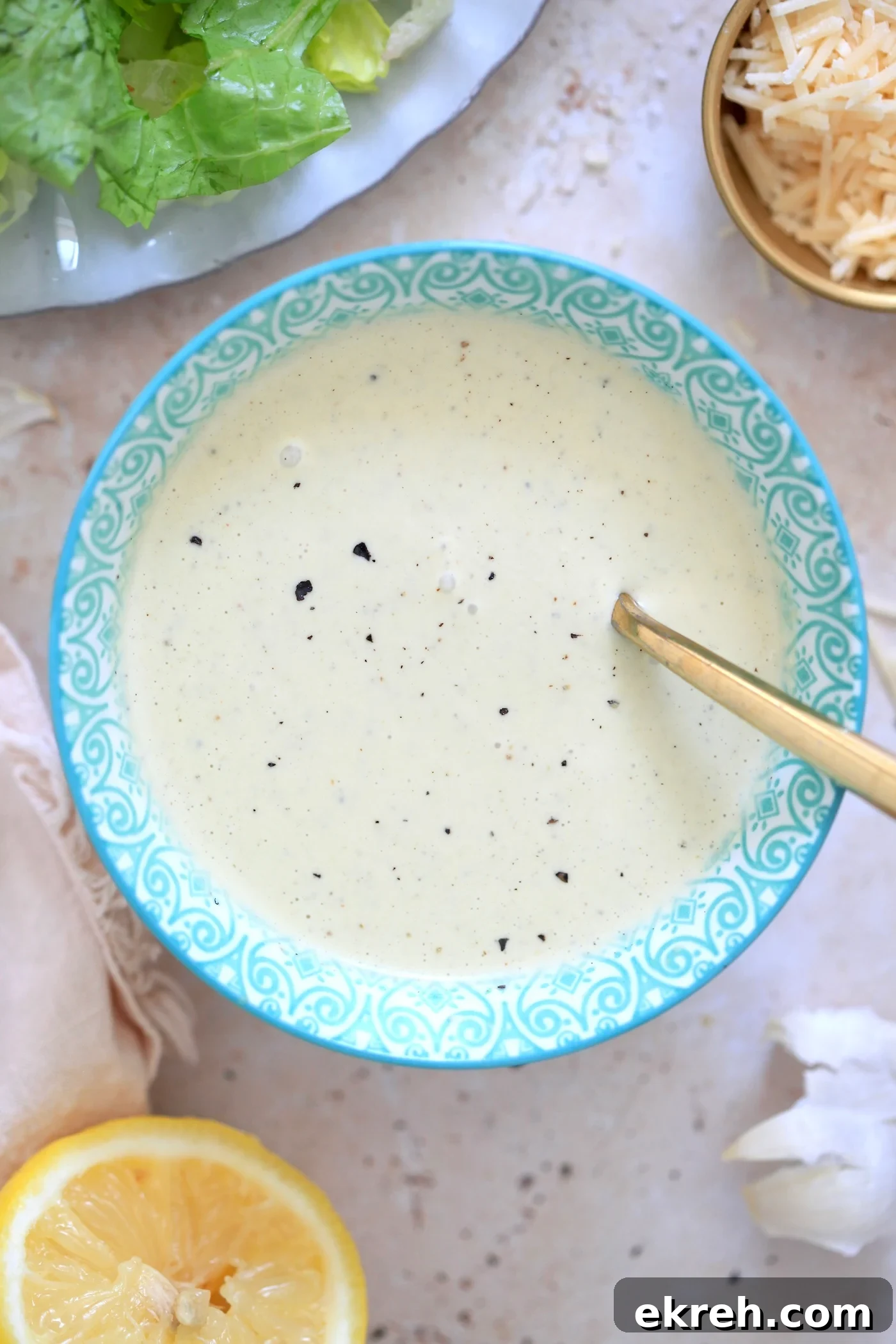 Blue bowl with creamy pale dressing.