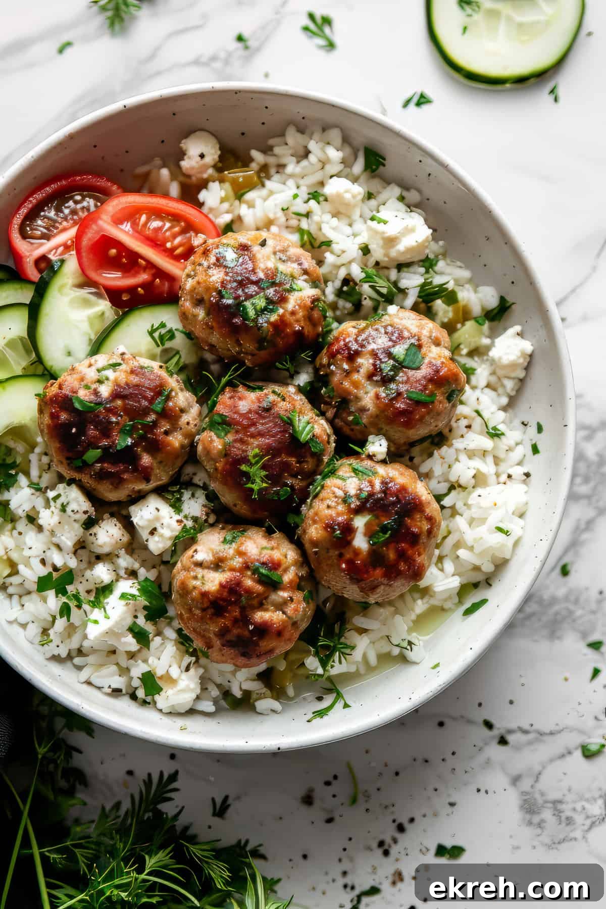 Classic Greek Chicken Meatballs with Tzatziki 6 Greek chicken meatballs with feta and rice.