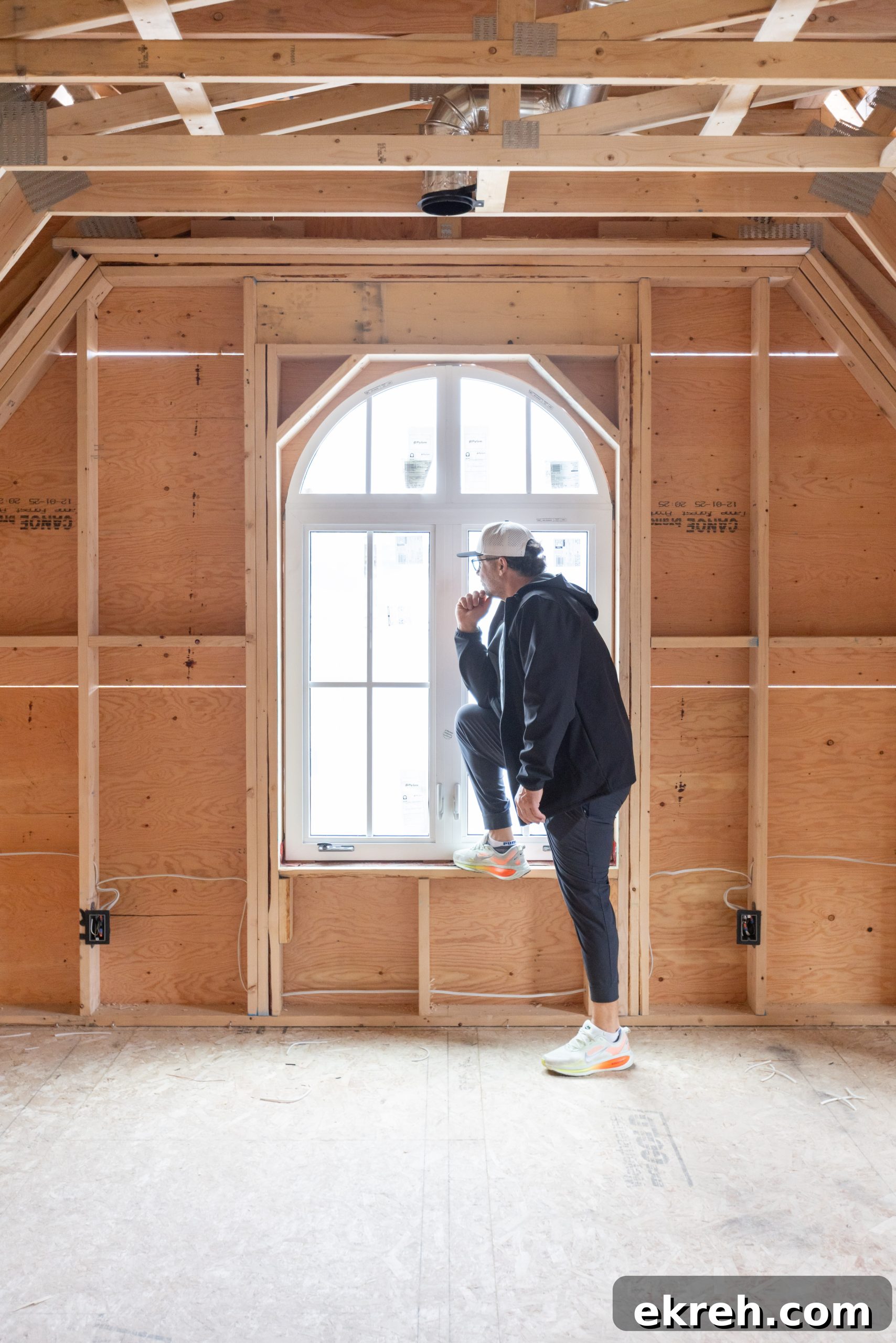 Charles, builder of this home, posing charmingly in new home