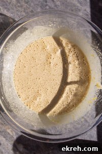 Making brownies by whipping eggs and sugar