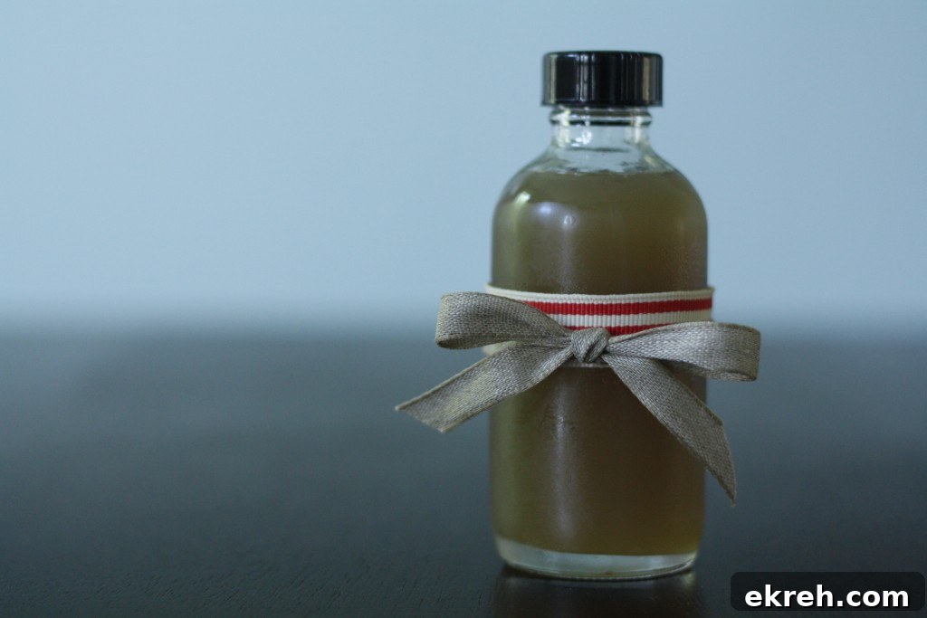 ginger syrup, present-ed Jar of ginger syrup presented