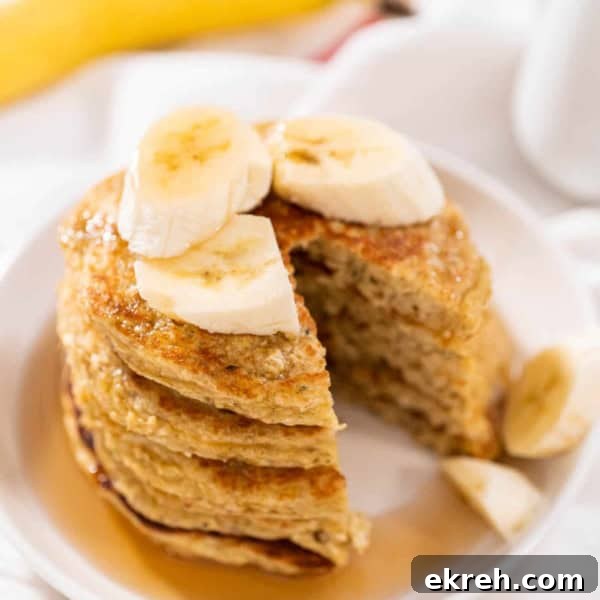 Top-Rated Toddler Plates and Feeding Tools 4 stack of pancakes with banana slices and syrup