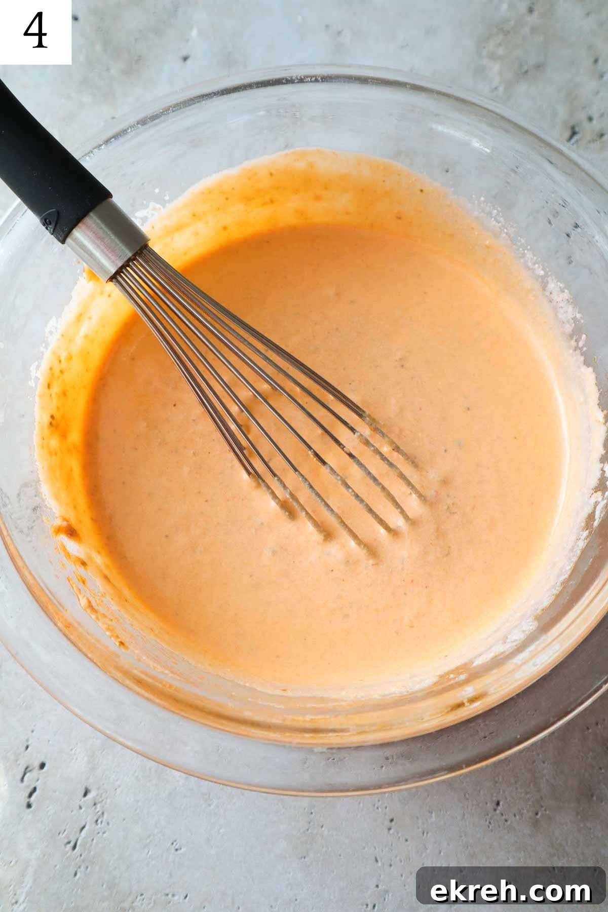 glass bowl with tomato pesto, heavy cream, and ricotta.