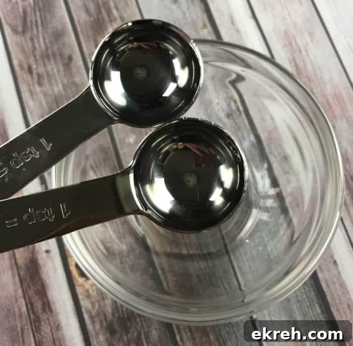 DIY kid-safe hand sanitizer recipe with essential oils - Germs are everywhere. When you can't get to a sink to wash your hands, keep clean with this natural homemade hand sanitizer gel {with essential oils}.