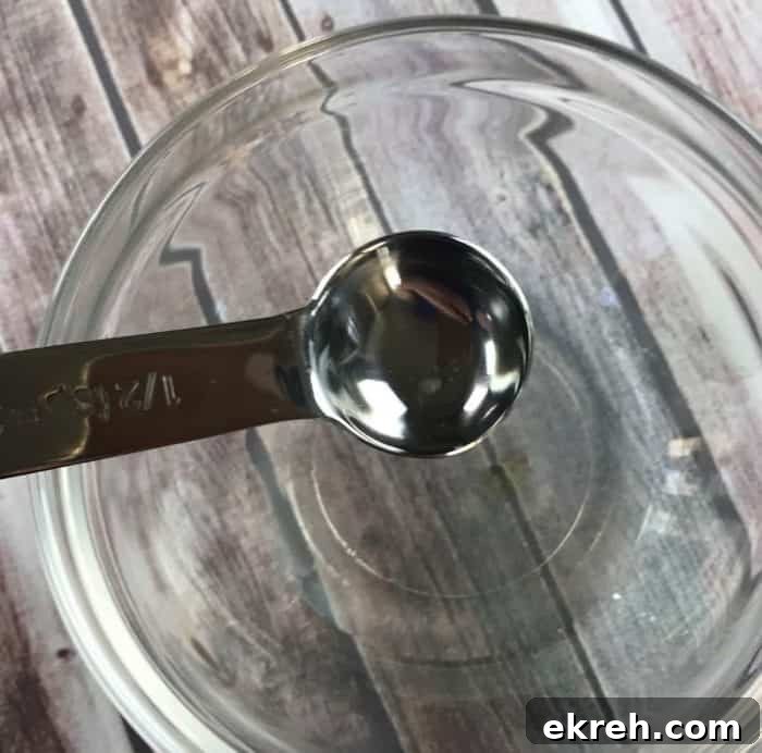 DIY kid-safe hand sanitizer recipe with essential oils - Germs are everywhere. When you can't get to a sink to wash your hands, keep clean with this natural homemade hand sanitizer gel {with essential oils}.