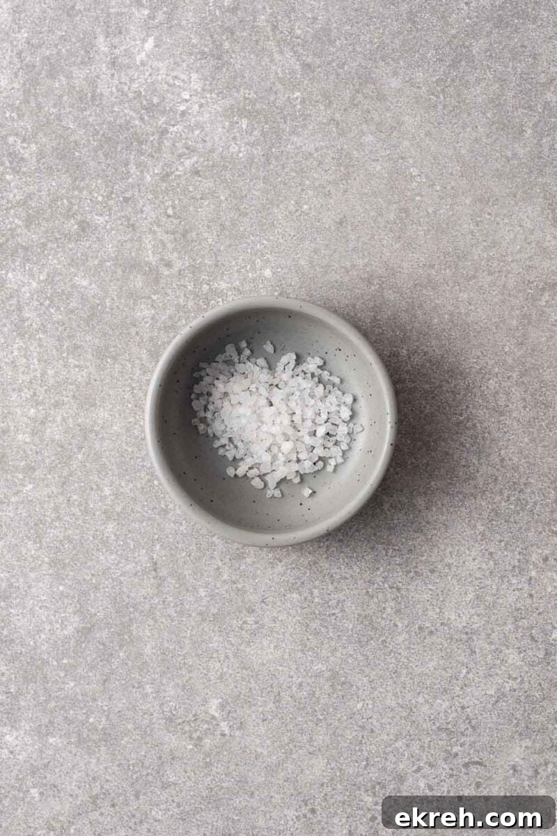 A small bowl with coarse sea salt.