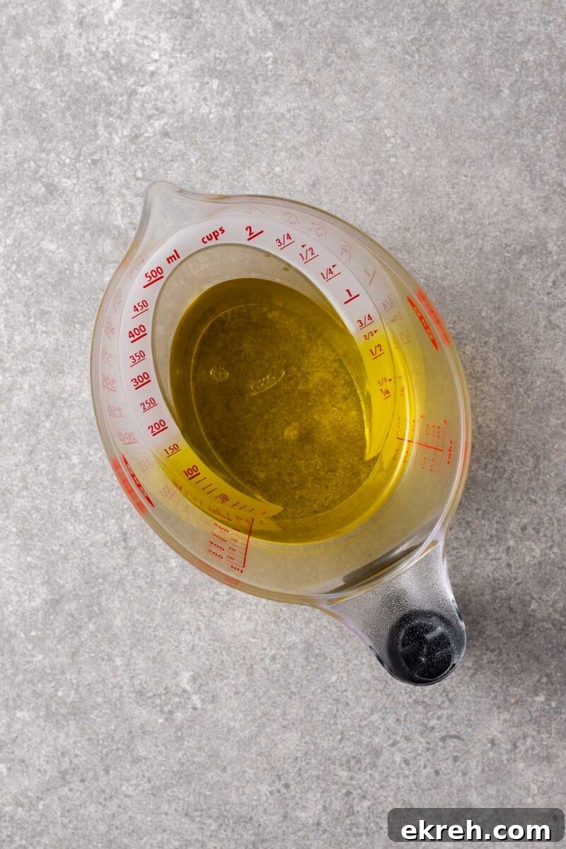 A measuring jag with extra virgin olive oil.