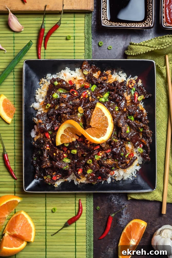 Spicy, Crispy Orange Beef. Thin strips of crisp sirloin steak tossed in a spicy, sweet, and savory orange sauce.