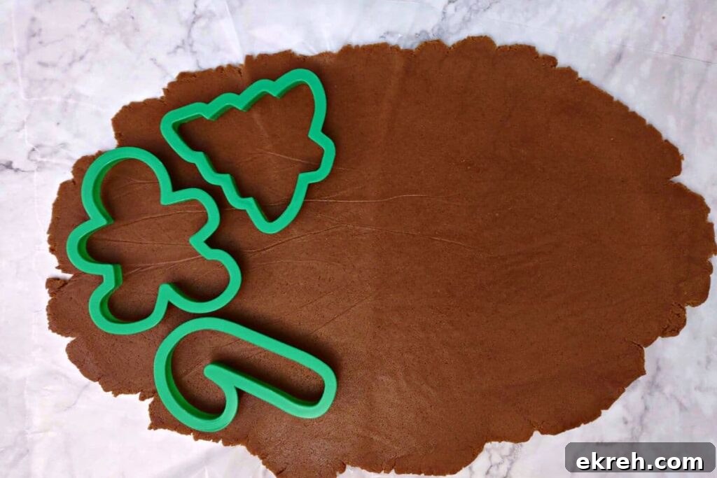 use tools to cut out your favorite shapes in gingerbread dough