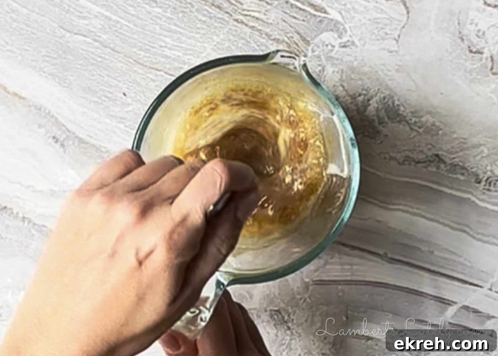 Brown Sugar Bacon Wrapped Green Bean Bundles Recipe 8 mixing butter, brown sugar, and garlic powder in a measuring cup.