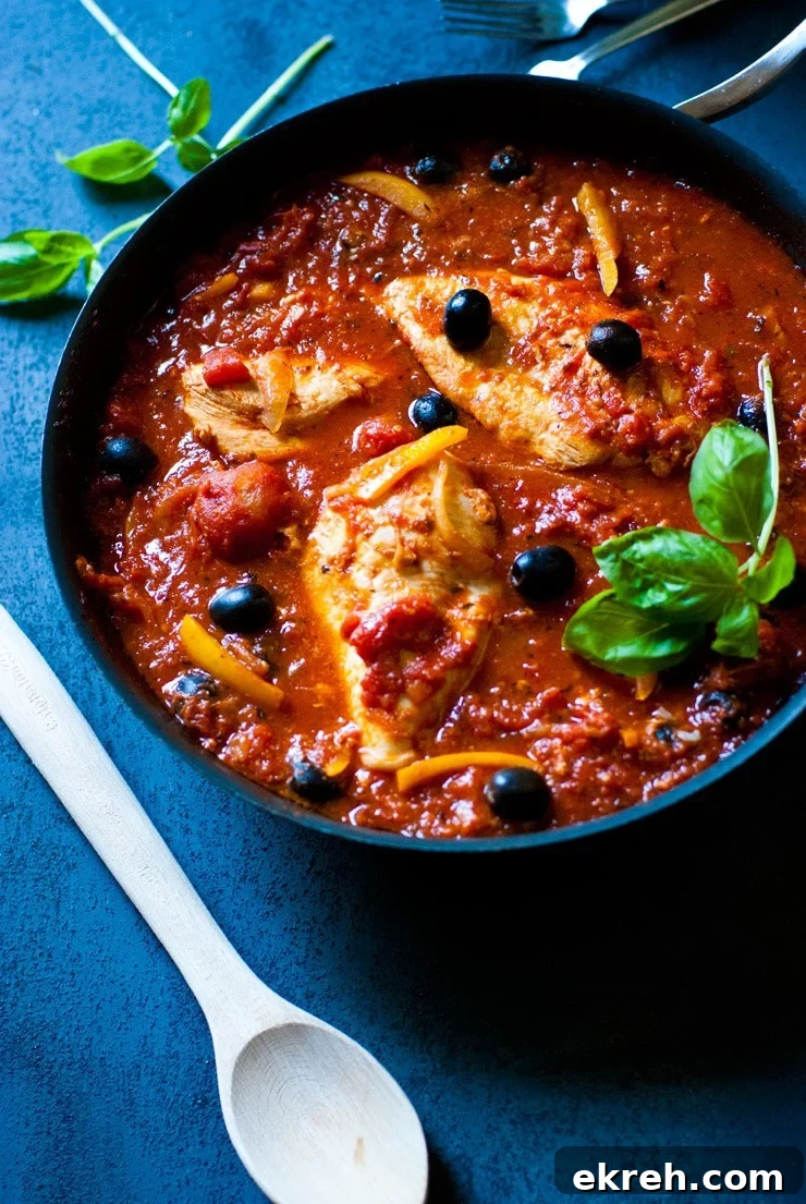 One Pan Chicken Cacciatore with Tomatoes and Olives 2 Easy Chicken Cacciatore cooked in a skillet with peppers and onions