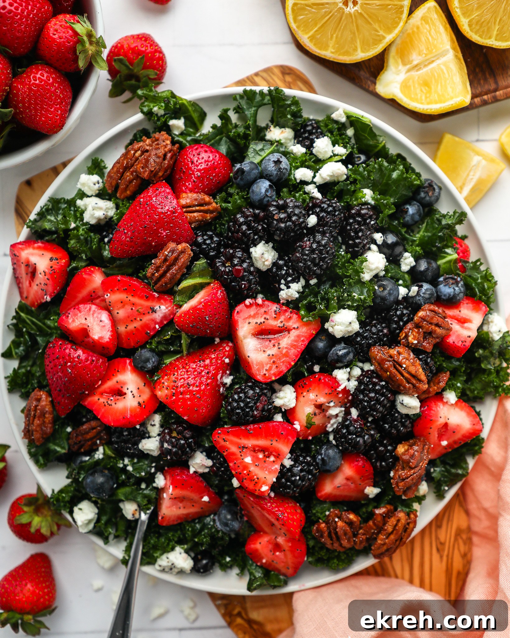 Kale Salad with Mixed Berries and Lemon Poppy Seed Dressing 5 This fruity kale salad is the best side dish for spring! You can easily make it ahead of time and it is always a crowd favorite too!
