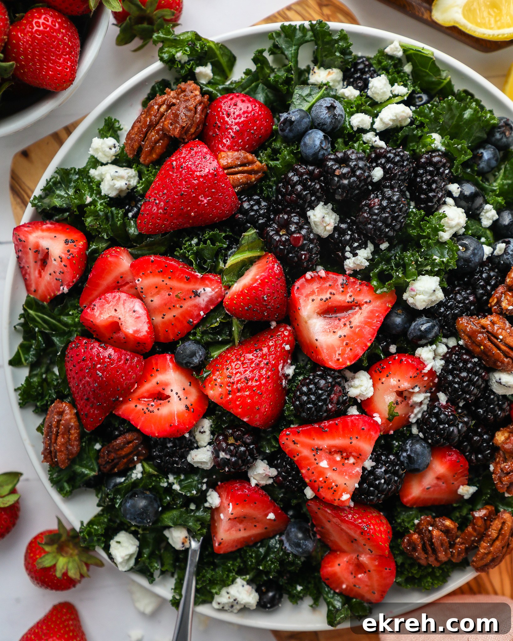 Kale Salad with Mixed Berries and Lemon Poppy Seed Dressing 6 Tender kale is tossed with strawberries, blackberries, blueberries and goat cheese to make this delicious spring salad!