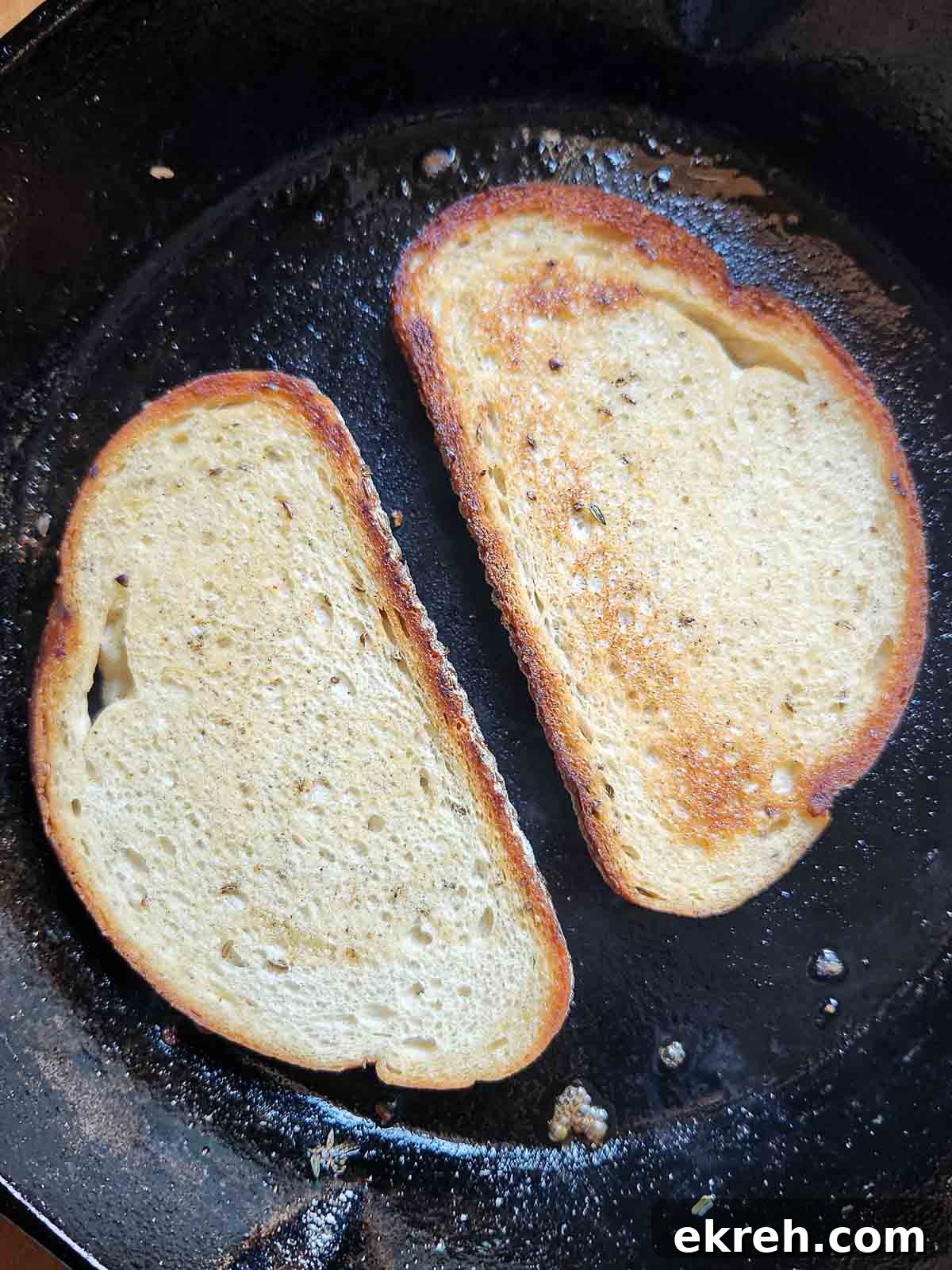 Toasted bread in a black skillet.