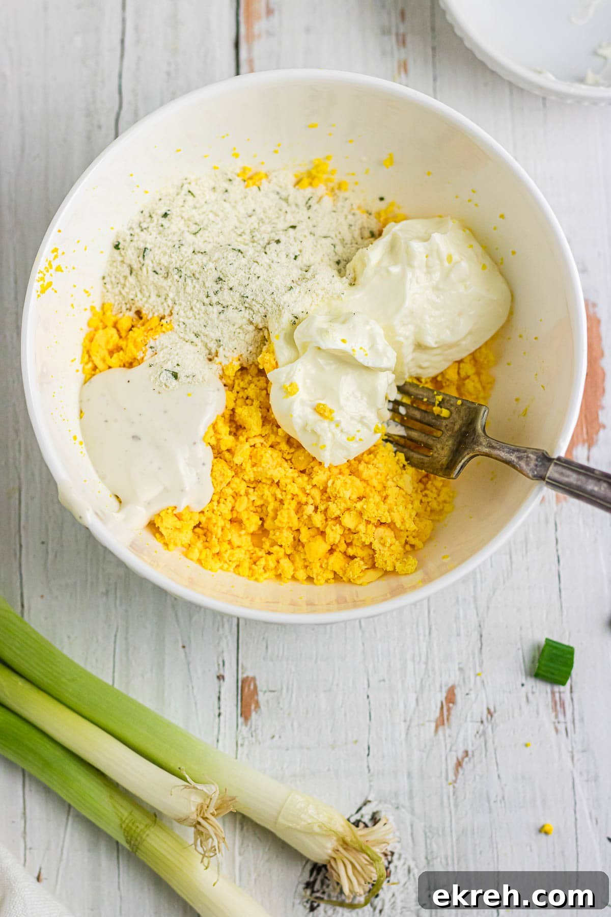 Creamy Ranch Deviled Eggs Recipe 6 Hard boiled egg yolks with remaining ingredients for deviled egg filling.