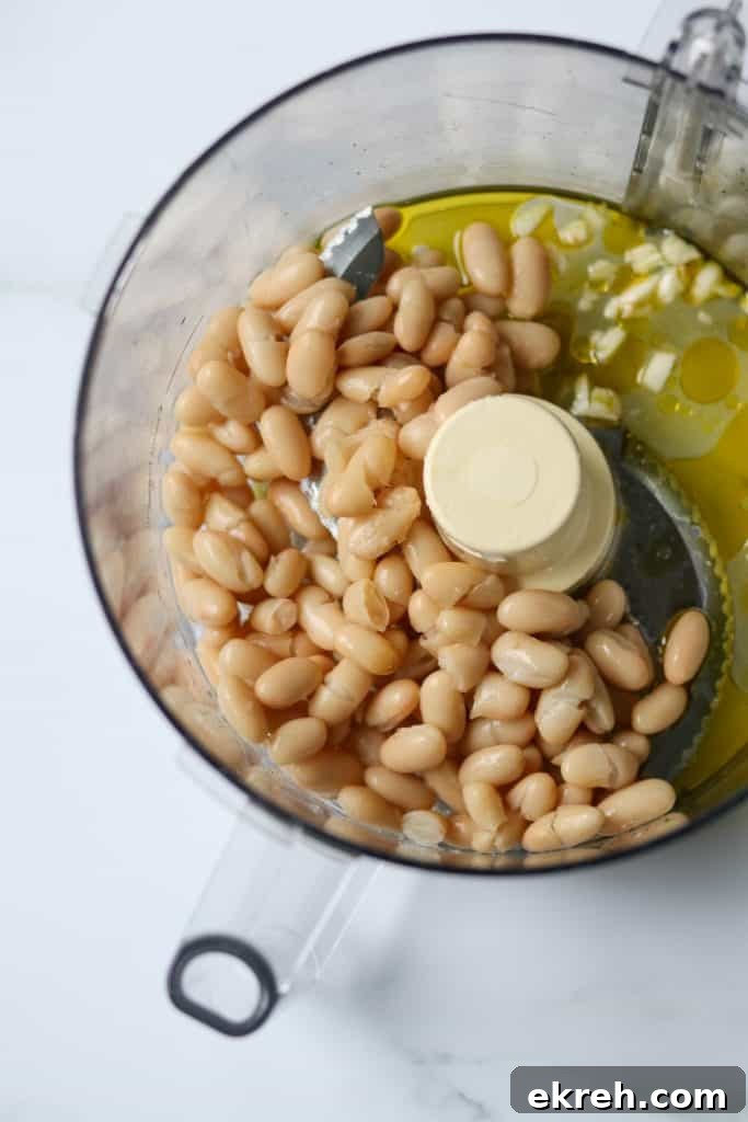 Balsamic-Glazed Mushroom Smorrebrod with White Bean Puree 3 White beans, olive oil and garlic in the work bowl of a food processor