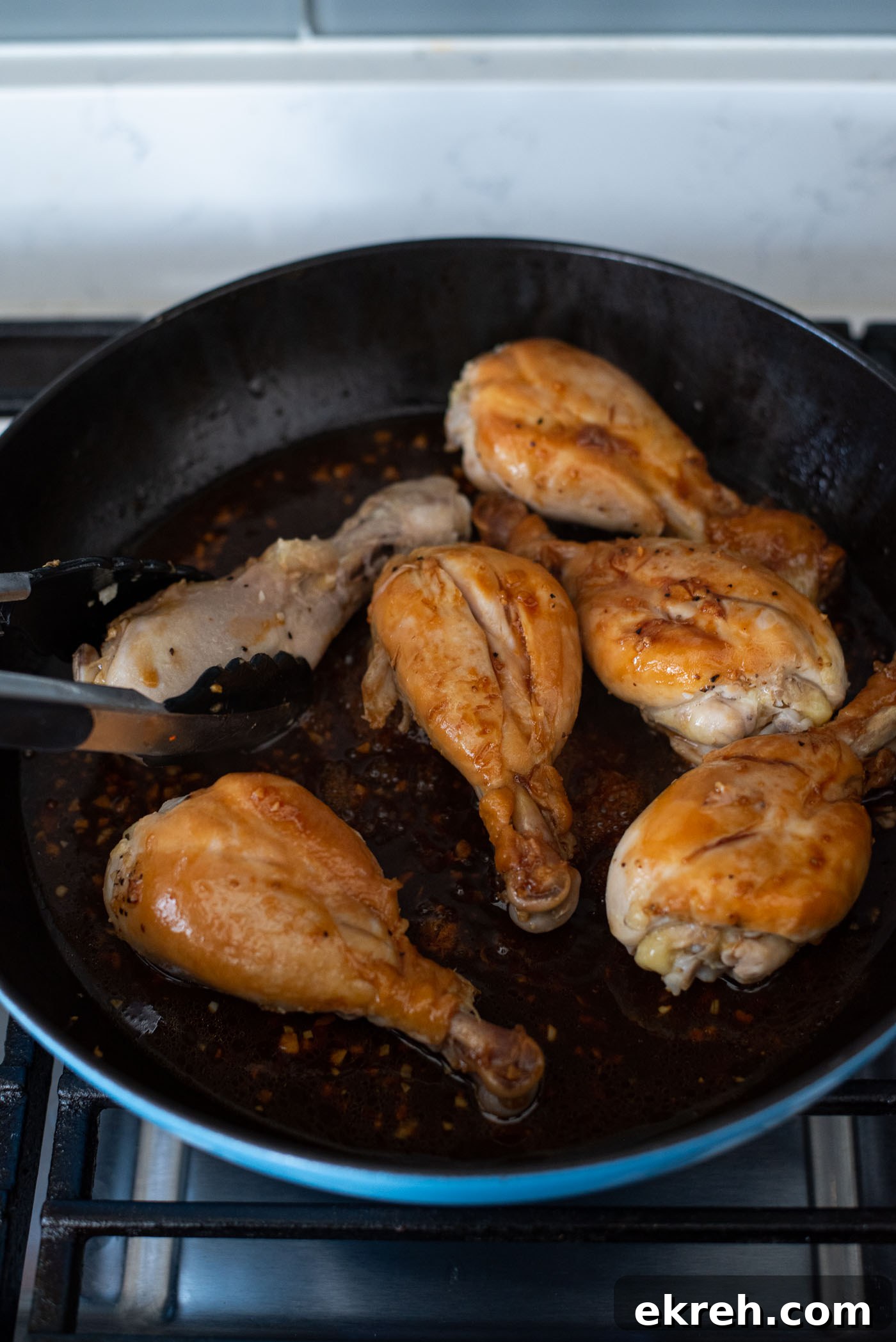 No-marinade teriyaki chicken cooking in a skillet.